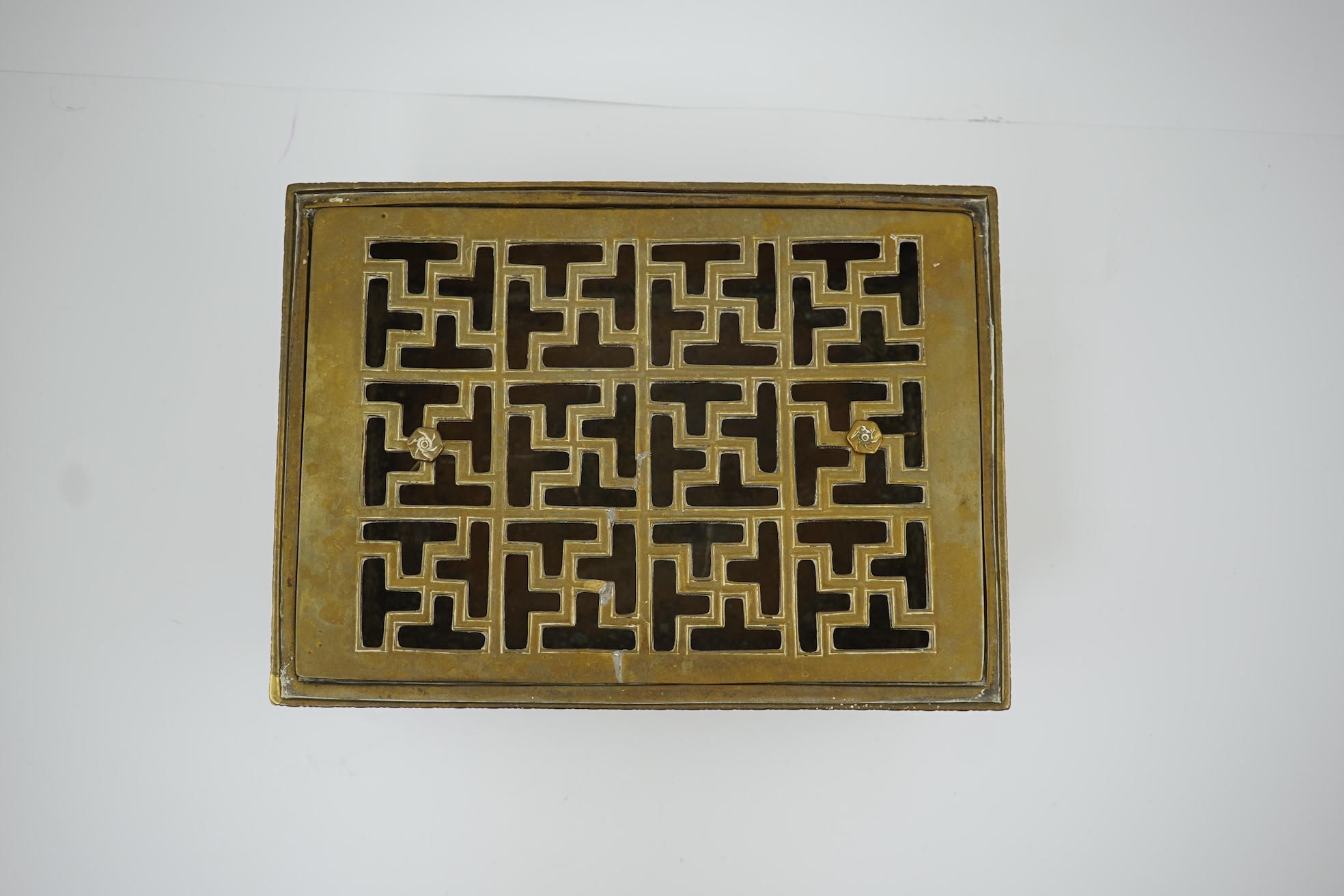 A large Chinese bronze rectangular censer and cover, Xuande seal mark, and a ‘plum blossom and chilong’ bronze censer, both 19th century